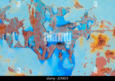 Peinture écaillée sur d'anciennes surfaces métalliques. La texture de fond de métal vieux Banque D'Images