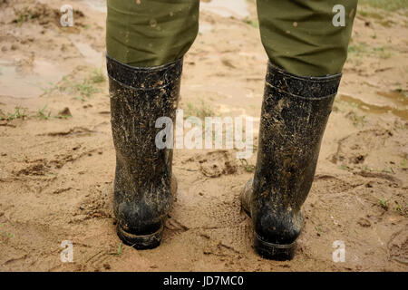 Bottes boueuses Banque D'Images