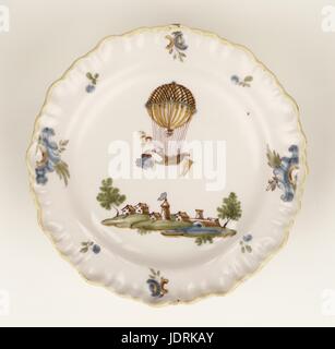 Plaque de faïence polychrome a tiré sur un feu vif avec un bord courbe, Moustiers, Fabrique de Féraud plaque commémorant l'expérience Testu-Brissy le 18 juin 1786 Diamètre 25 cm Collection Muller-Quênot même entrerprising s spiritueux expériences aérostatiques en aiderait. Testu-Brissy a réalisé le premier vol de nuit le 18 juin 1786. Après avoir été dans l'air pendant près de 8 heures à proximité d'Ecouen, il est entré dans une tempête. Quand il était à une hauteur de six cent soixante huit toises' la température est tombée en dessous de zéro et la télécabine est devenu couvert de glace, de neige et de grêle. L'engin a Banque D'Images