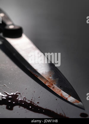 Close up of bloody knife Banque D'Images