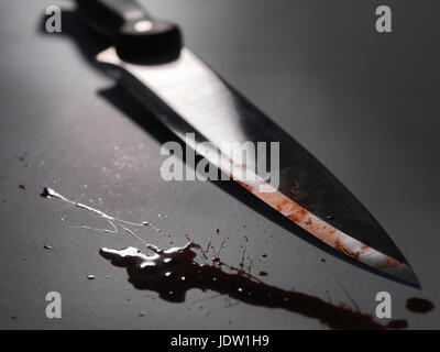 Close up of bloody knife Banque D'Images