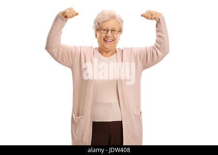 Cheerful mature woman flexing muscles isolé sur fond blanc Banque D'Images