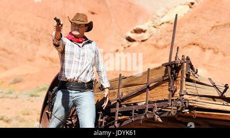 Sud-ouest - un cowboy prend du temps pour se reposer et réfléchir. Banque D'Images