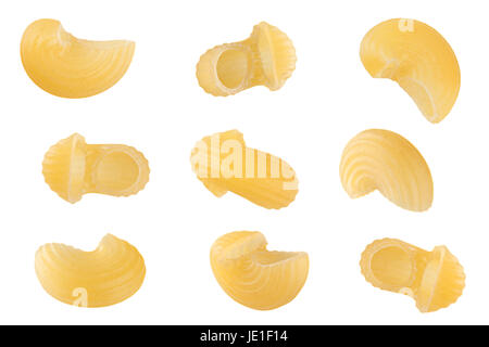 Sec jaune pâtes swirl pièces ensemble isolé sur fond blanc Banque D'Images