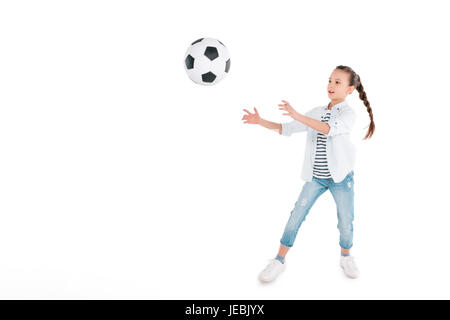 Little girl with soccer ball isolated on white, enfants sport concept Banque D'Images