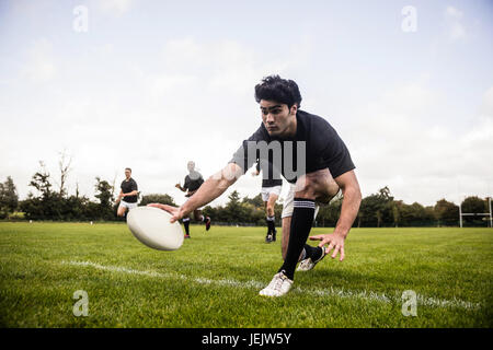 La formation des joueurs de rugby sur pitch Banque D'Images