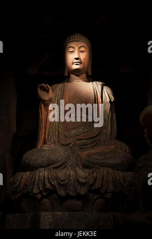 Bouddha en pierre et des reliques de la Zhongshan grottes, en Zichang County affiche au Musée d'histoire du Shaanxi à Xi'an, province du Shaanxi en Chine Banque D'Images