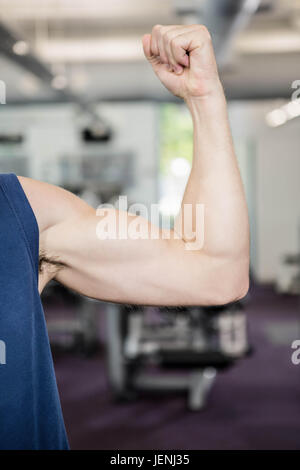 Close up of man showing biceps Banque D'Images