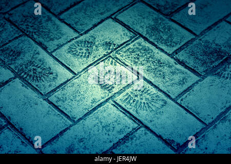 Empreinte sur le ciment, détail d'un shoeprint, sign Banque D'Images