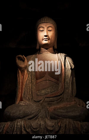 Bouddha en pierre et des reliques de la Zhongshan grottes, en Zichang County affiche au Musée d'histoire du Shaanxi à Xi'an, province du Shaanxi en Chine Banque D'Images