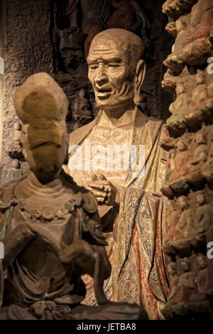 Bouddha en pierre et des reliques de la Zhongshan grottes, en Zichang County affiche au Musée d'histoire du Shaanxi à Xi'an, province du Shaanxi en Chine Banque D'Images