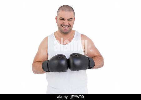 Boxer wearing head protector et gants Banque D'Images