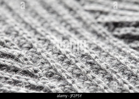 La laine tricot gris texture background. Banque D'Images