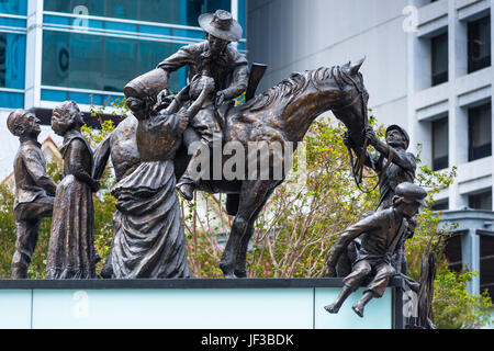 Le tableau Petrie, sculpture groupe créé en 1988 pour reconnaître les familles pionnières de Brisbane, en face de l'Hôtel de Ville. Le Queensland. L'Australie. Banque D'Images