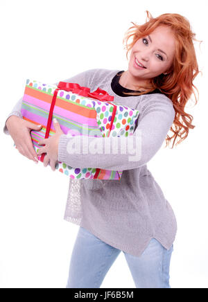 Woman holding gift box Banque D'Images