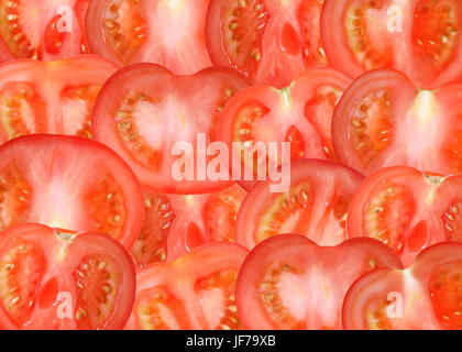 Contexte faits de beaucoup de fraîcheur des tranches de tomate rouge Banque D'Images