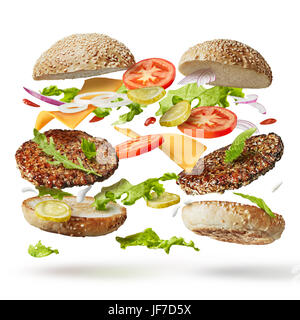 Burger avec des ingrédients de vol Banque D'Images