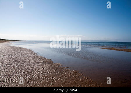 La plage de Troon à au sud vers Ayr et Brown Carrick Hill Ayrshire en Écosse Banque D'Images