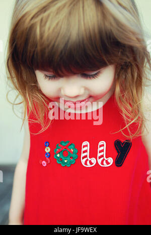 Heureux tout-petit port jolly christmas dress Banque D'Images