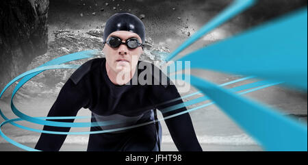 Composite image swimmer in wetsuit Banque D'Images