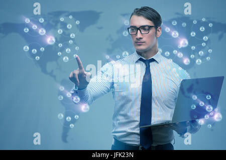 Businessman with laptop dans social network concept Banque D'Images