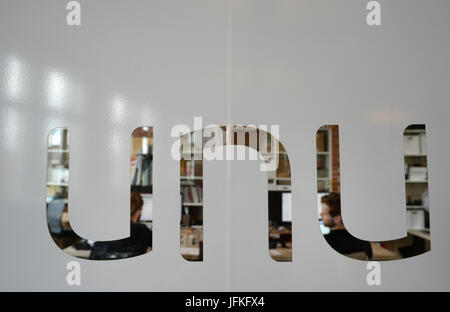 Berlin, Allemagne. 29 Juin, 2017. Le logo de la société de la mobilité démarrer 'UNU' à Berlin, Allemagne, 29 juin 2017. Les moteurs de l'UNU est l'un des chefs de la progression rapide orienté marque start-ups, d'après une étude de conseil en marque. Ils sont donc l'une des "marques de percée". Les berlinois ont été produisant les scooters électroniques depuis 2014. Le démarrage a commencé à étendre dans d'autres pays européens en 2016 photo : Jens/Kalaene Zentralbild-dpa/ZB/dpa/Alamy Live News Banque D'Images