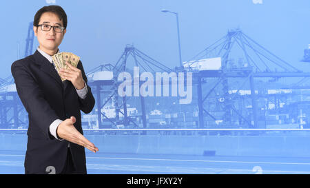 Double exposition businessman shaking hand sur port cargo container grue floue fond. concept d'entreprise. Banque D'Images