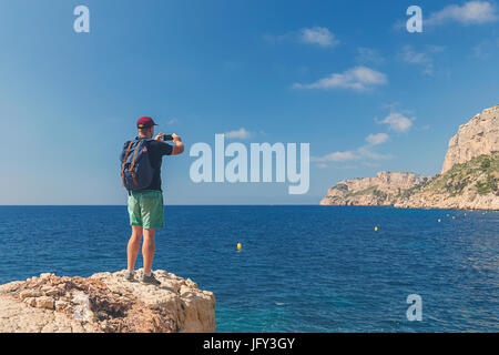 La prise de photo sur littoral adultes Banque D'Images