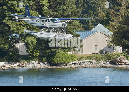 Seair Seaplanes Cessna 208 Caravan rendant son approche dans le port de Vancouver Aéroport de l'eau, de la Colombie-Britannique, Canada. Banque D'Images