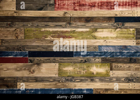 Mur de planches de bois de différentes couleurs. Abstract grunge background texture bois. Banque D'Images