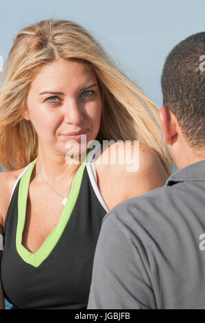 Man and Woman standing outdoors Banque D'Images