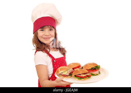 Happy little girl cook avec sandwiches Banque D'Images