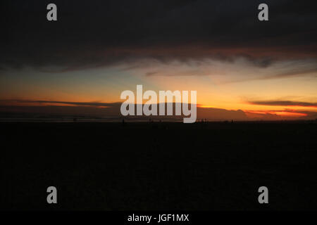 Coucher de soleil, plage, 2014, Praia Grande, Côte Paulista, Sao Paulo, Brésil. Banque D'Images