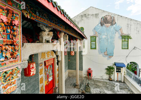 Kung Fu girl par l'artiste Ernest Zacharevic. Street art situé à Georgetown, l'île de Penang, en Malaisie. Banque D'Images