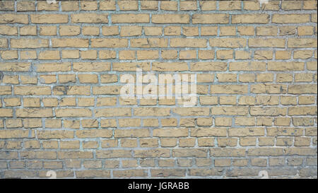 Jaune blanc fond mur brique tan full frame Banque D'Images