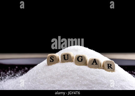 Gros plan des blocs lettre formant le mot sugar Banque D'Images