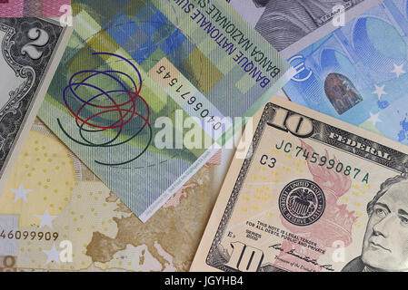 Abstract dollar euro et franc suisse contexte Banque D'Images