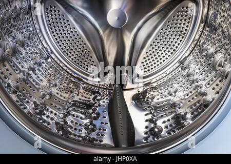 Vue rapprochée de l'intérieur d'un tambour de machine à laver Banque D'Images