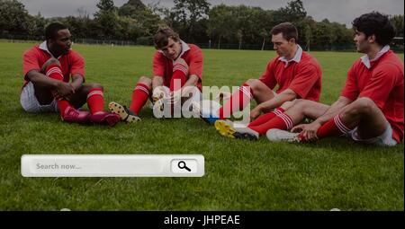Barre de recherche de composite numérique contre les joueurs de football photo Banque D'Images
