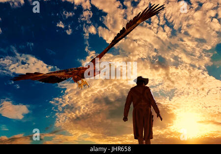 Illustration d'un cow-boy au coucher du soleil avec un aigle - le rendu 3D Banque D'Images