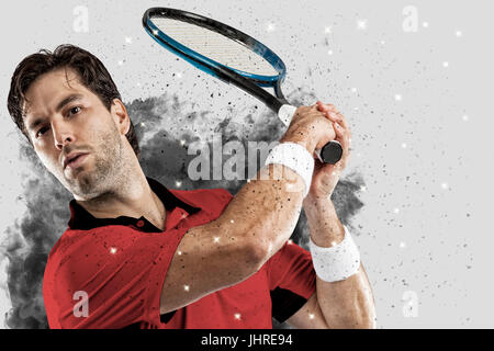 Joueur de tennis avec un uniforme rouge qui sort d'une explosion de fumée . Banque D'Images