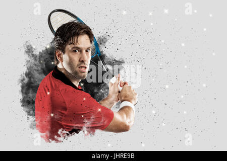 Joueur de tennis avec un uniforme rouge qui sort d'une explosion de fumée . Banque D'Images