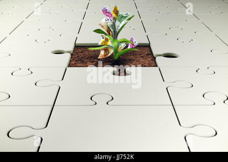Plante avec de l'argent pousse à partir d'une pièce manquante du puzzle Banque D'Images