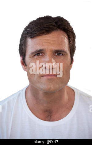 Portrait of man with brown hair against white background Banque D'Images