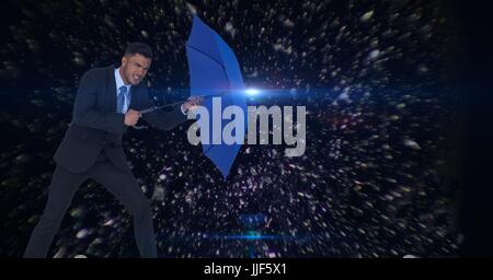 Digital composite of Digital composite image of businessman holding bleu au milieu d'astéroïdes Banque D'Images