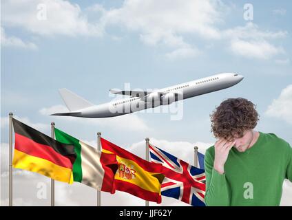 Langue principale de drapeaux derrière jeune homme. Derrière l'avion Banque D'Images