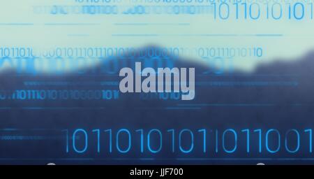 Digital composite de code binaire bleu contre la montagne floue Banque D'Images