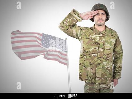 Soldat en face de le drapeau américain Banque D'Images