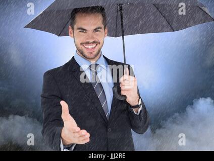 Smiling businessman 3D offrant sa main tenant un parapluie Banque D'Images