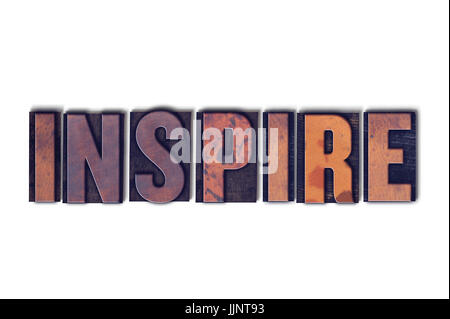 Le mot concept Inspire et le thème écrit en bois vintage typo sur fond blanc. Banque D'Images